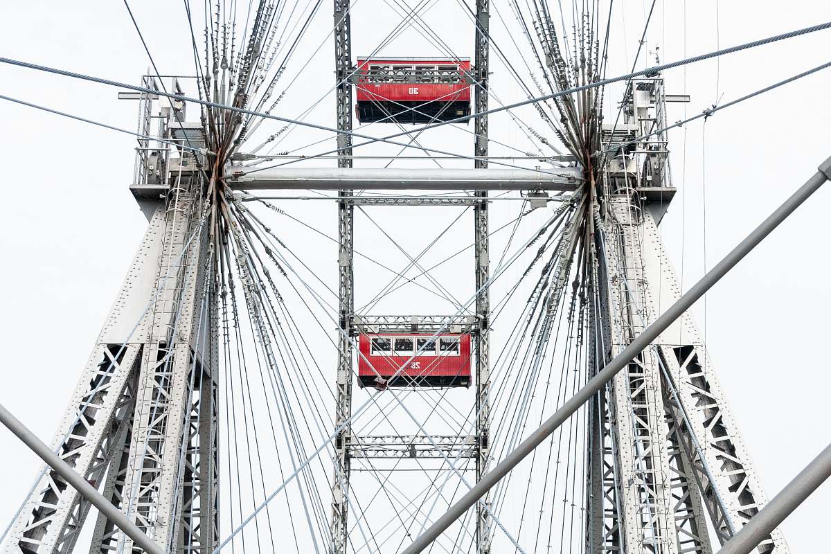 amusement park red and white metal tower ferris wheel